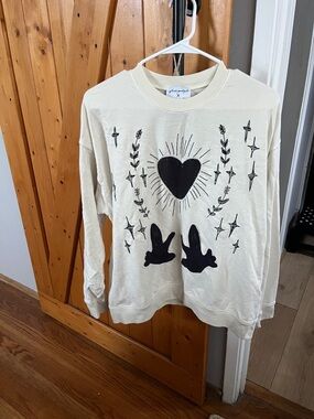 Free People Tricia Fix Cream Sweatshirt with Dark Navy Blue Embroidered Graphic